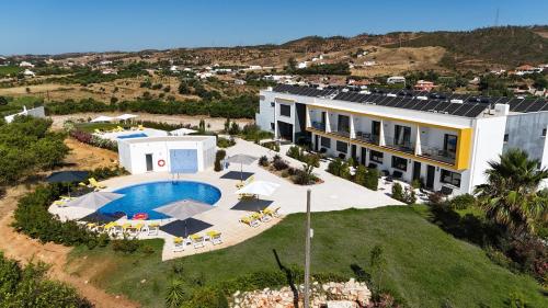 an aerial view of a villa with a swimming pool at Orange Grove Residence in Silves