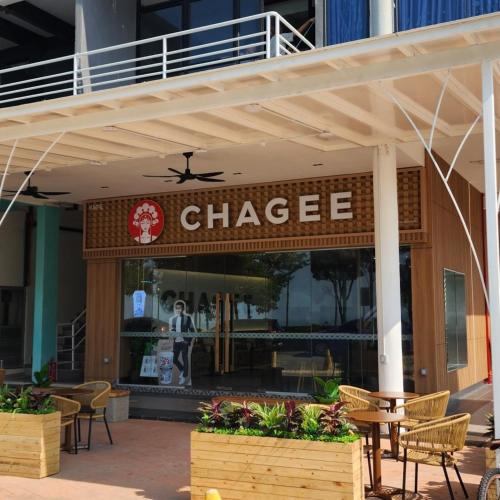 a chinese restaurant with a table and chairs in front of it at PD DWharf Hotel Suite & Serviced Residence in Port Dickson