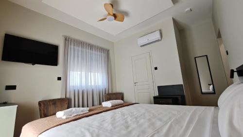 Postel nebo postele na pokoji v ubytování St Lazarus City Hotel