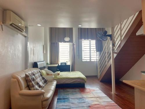 Zona de estar de Minimalist Duplex @ BayanLepas