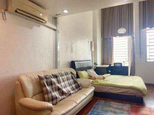 Zona de estar de Minimalist Duplex @ BayanLepas