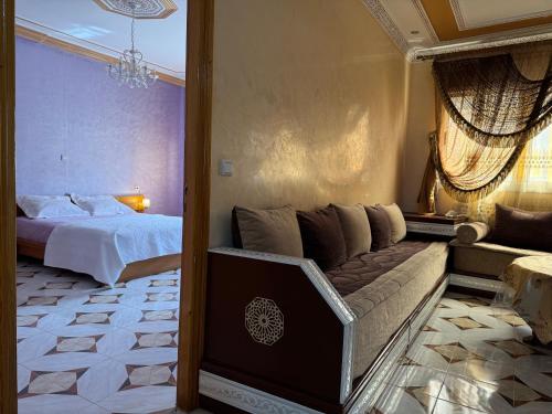 Postel nebo postele na pokoji v ubytování Appartements dior al hoceima