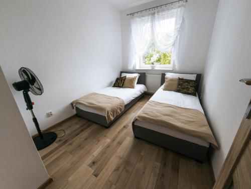 Ένα ή περισσότερα κρεβάτια σε δωμάτιο στο Stay Center