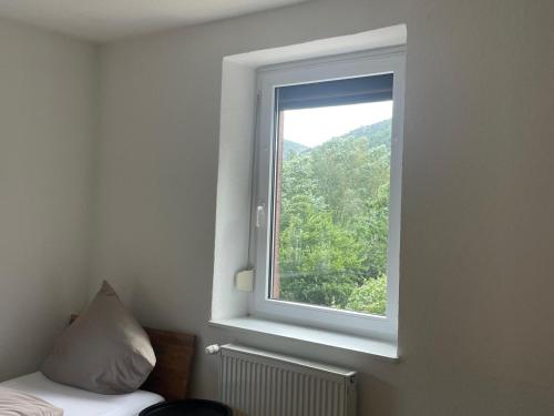 Ένα ή περισσότερα κρεβάτια σε δωμάτιο στο Haus Grünwald