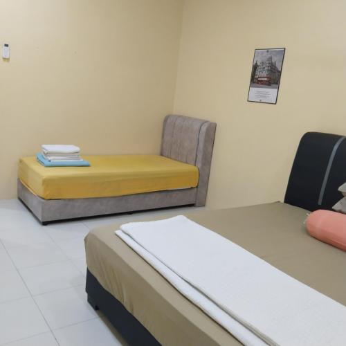 Χώρος καθιστικού στο Happy Raub Guest House