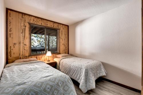 Snowflake Chalet condoにあるベッド