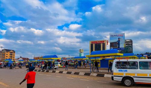 a group of gas stations on a city street at Ngong Hills View in Ngong