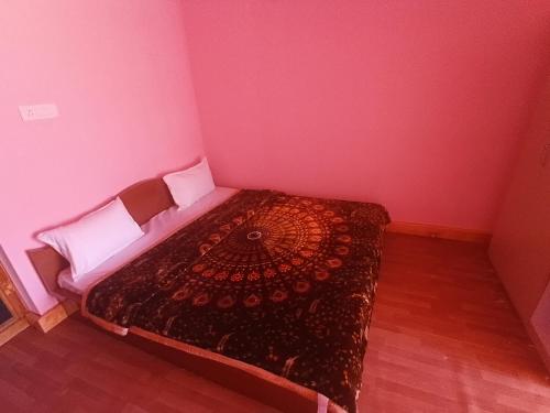 Postel nebo postele na pokoji v ubytování Tashi Khangsar