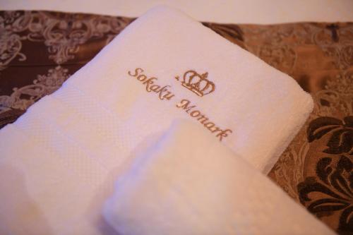 a white napkin with the words wedding banquet on it at Sokaku Monark in Berat