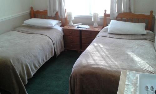 Cama ou camas em um quarto em Gilesgate Moor Hotel