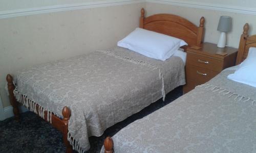 Cama ou camas em um quarto em Gilesgate Moor Hotel
