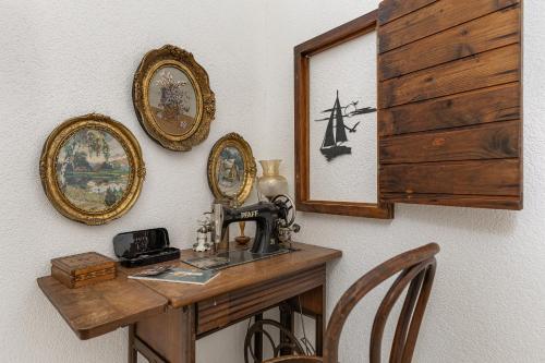a room with a wooden table with a sewing machine on it at *NEW IN 2025* - Hotel Subra Atrium in Herceg-Novi