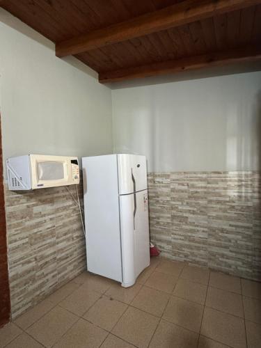 Kuchyň nebo kuchyňský kout v ubytování Náutico Apart Hotel