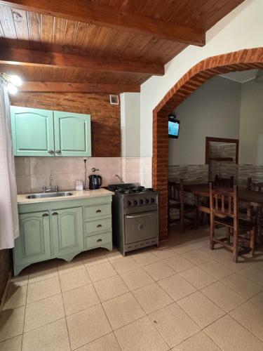 Kuchyň nebo kuchyňský kout v ubytování Náutico Apart Hotel