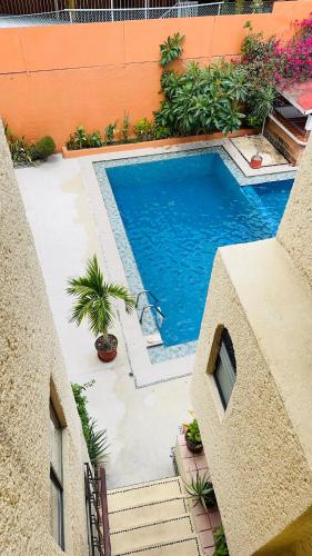 Der Swimmingpool an oder in der Nähe von Zihua Mia Hotel Boutique