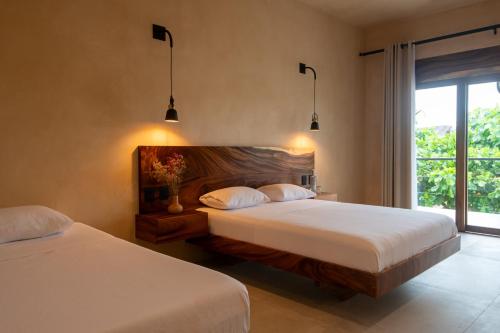 Ein Bett oder Betten in einem Zimmer der Unterkunft Zantuar