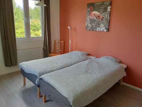 Postel nebo postele na pokoji v ubytování Folsom