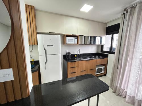 Dapur atau dapur kecil di Apartamento no Icon by Bexap Stays