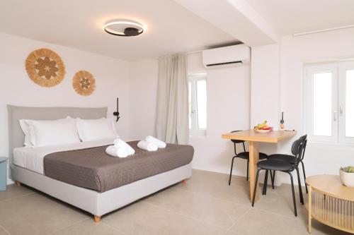 Ένα ή περισσότερα κρεβάτια σε δωμάτιο στο Nisos Mykonos Studio 2