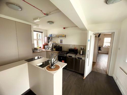 a kitchen with a sink and a counter top at The Nest at Strandhill in Strandhill