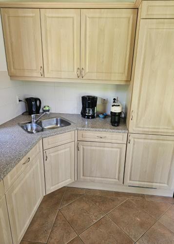 Kuchyň nebo kuchyňský kout v ubytování Vakantie woning Groesbeek