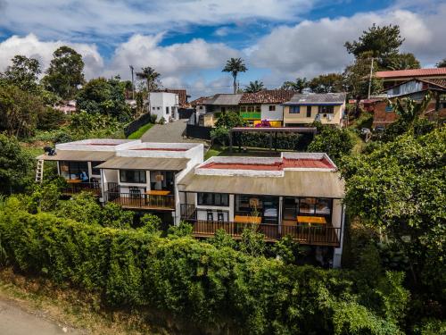 an aerial view of a house on a hill at Salento Pequeño Hotel in Salento