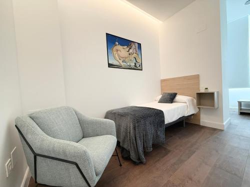 Apartamentos Mk77 León Zuloagaにあるベッド