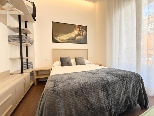 Apartamentos Mk77 León Zuloagaにあるベッド