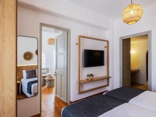 Letto o letti in una camera di Mr & Mrs Mykonos The Residence