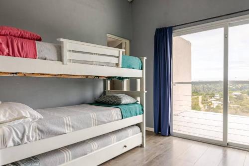 Postel nebo postele na pokoji v ubytování Casa Dos Lunas