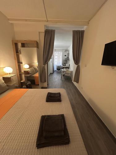 Ένα ή περισσότερα κρεβάτια σε δωμάτιο στο Nido Veronetta