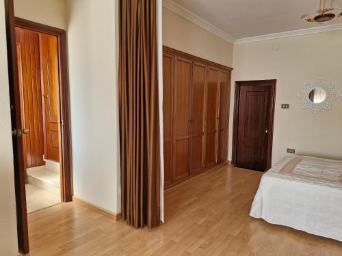 Ένα ή περισσότερα κρεβάτια σε δωμάτιο στο Casa Caldelas