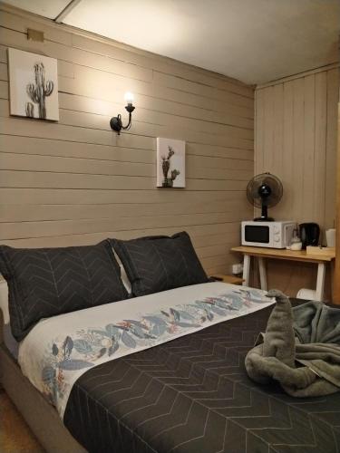 Habitacion Arrayan房間的床