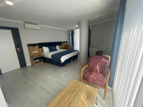 Una cama o camas en una habitación de HANN OTEL