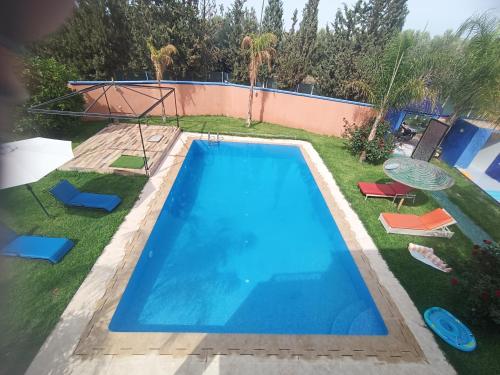 Piscine de l'établissement villa paradisiaque ou située à proximité