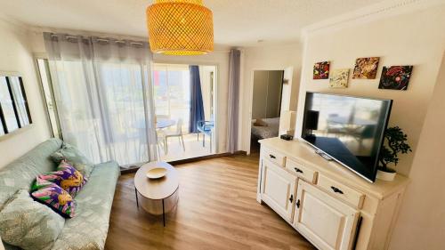 TV a/nebo společenská místnost v ubytování Logement entier - Idéalement situé