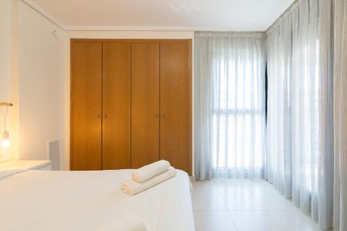 Apartamento con Vistas al mar, Piscina y Pista de Paddle