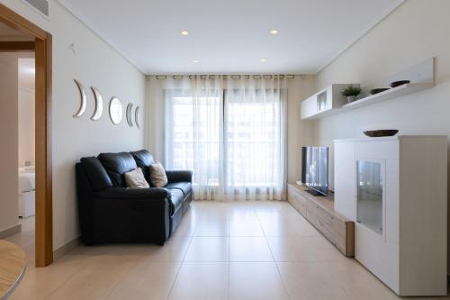 Apartamento con Vistas al mar, Piscina y Pista de Paddle