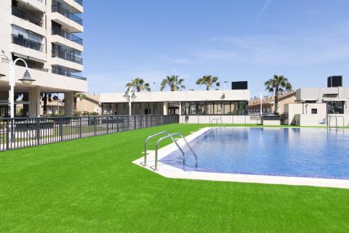 Apartamento con Vistas al mar, Piscina y Pista de Paddle
