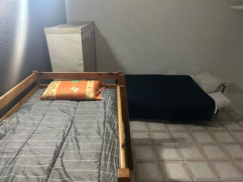 Postel nebo postele na pokoji v ubytování Casa ANCLA