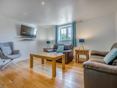 Et opholdsområde på Home Park Farm Cottages B