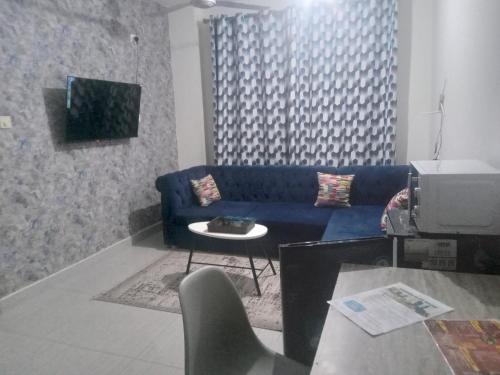 TV a/nebo společenská místnost v ubytování Karibu homestay-nyali