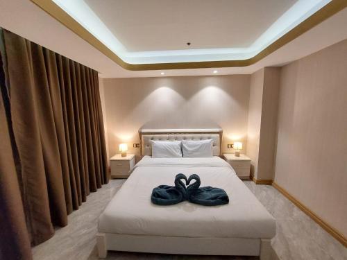 Ένα ή περισσότερα κρεβάτια σε δωμάτιο στο Gorgeous 1BR in One Euphoria