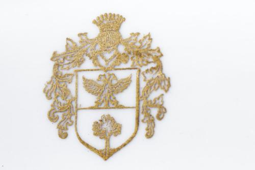 a gold coat of arms of the kingdom of ireland crest at Relais Donna Lucrezia in Rome