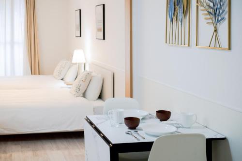 Ένα ή περισσότερα κρεβάτια σε δωμάτιο στο GuestHouse MIYABI
