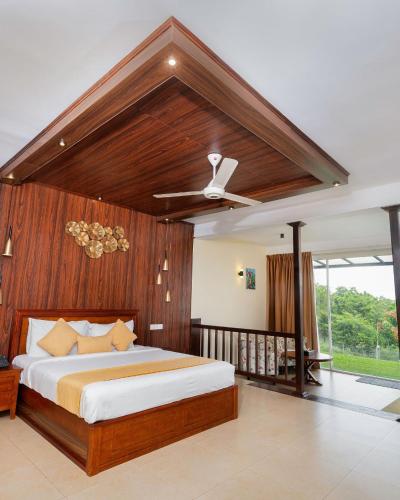 Postel nebo postele na pokoji v ubytování Birds Resort Hambantota