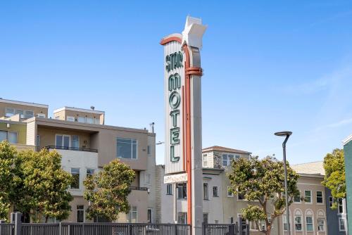 a hotel sign in front of a building at Star Motel in San Francisco