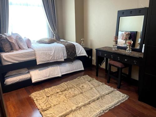 Ένα ή περισσότερα κρεβάτια σε δωμάτιο στο 2 Bedroom apartment at Senayan