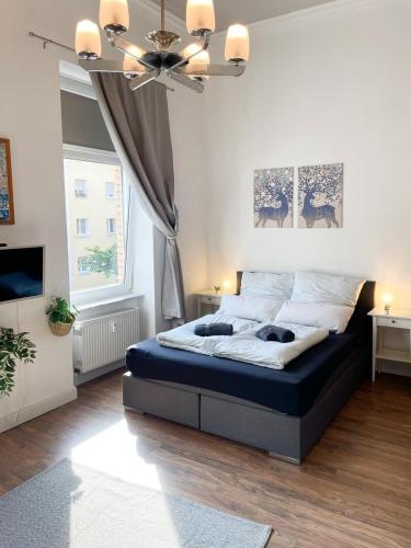Katil atau katil-katil dalam bilik di Business Central Apartment Wiesbaden