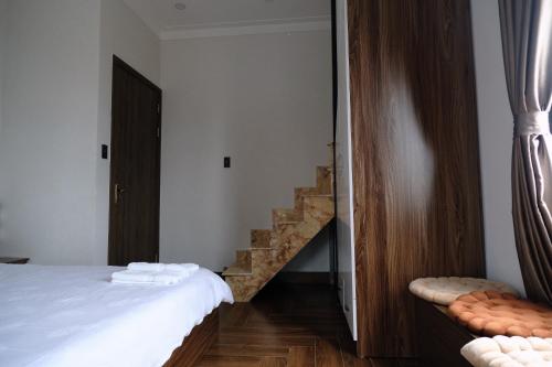 Ein Bett oder Betten in einem Zimmer der Unterkunft I'm Home in Dalat